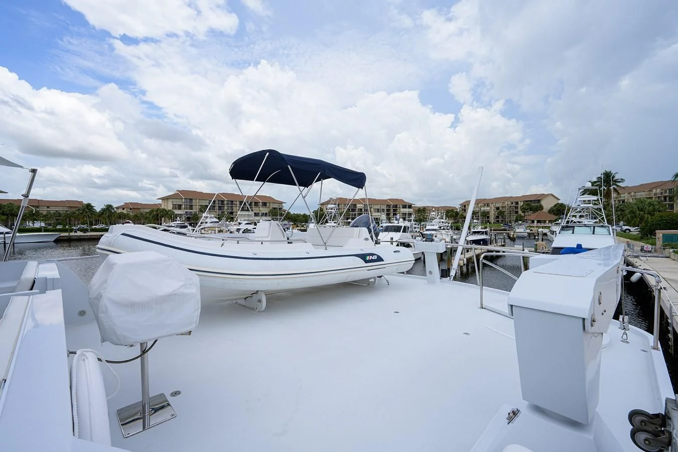 a boat docked at a pier aboard ARIES Yacht for Sale