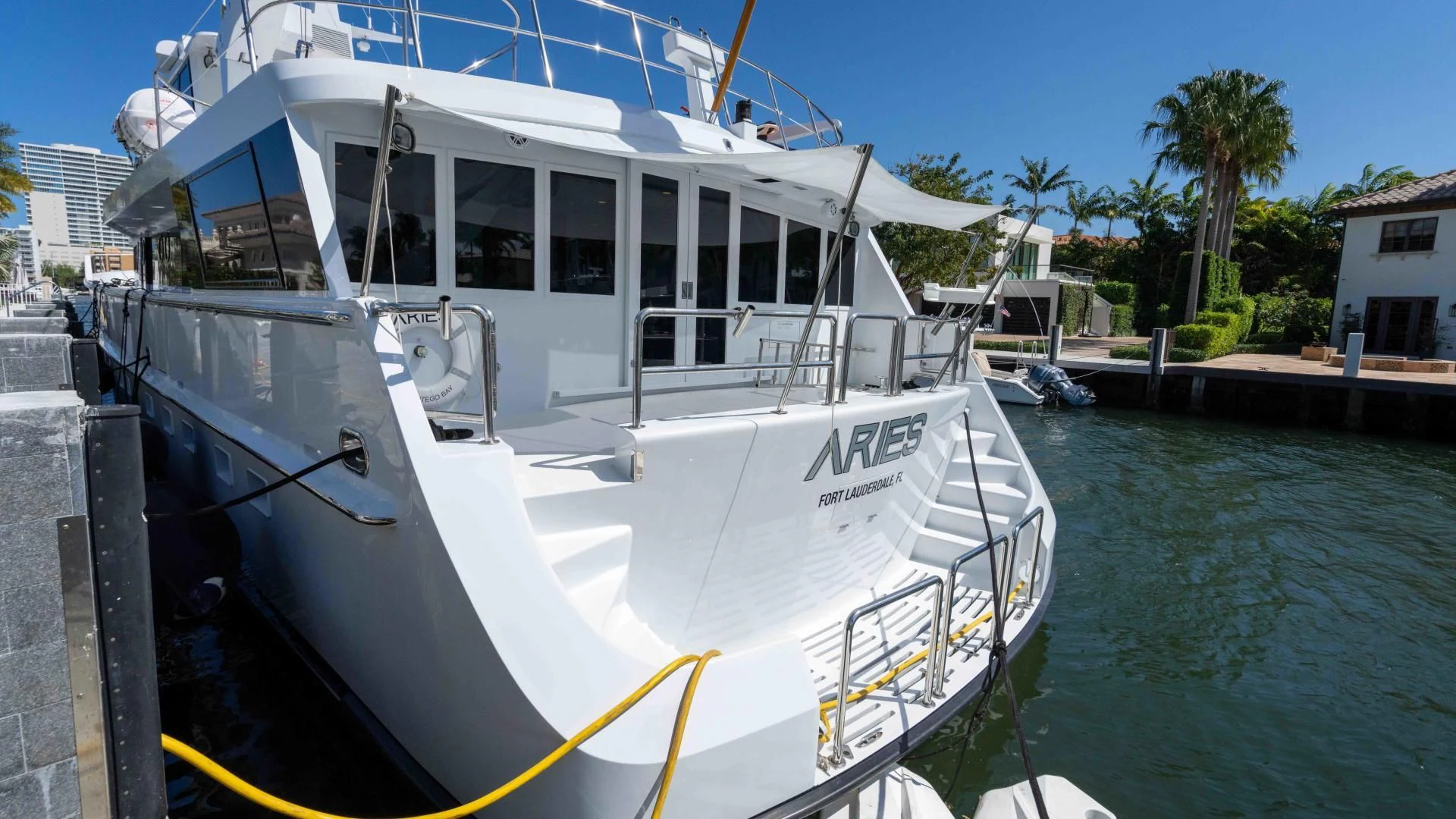 a boat docked at a dock aboard ARIES Yacht for Sale