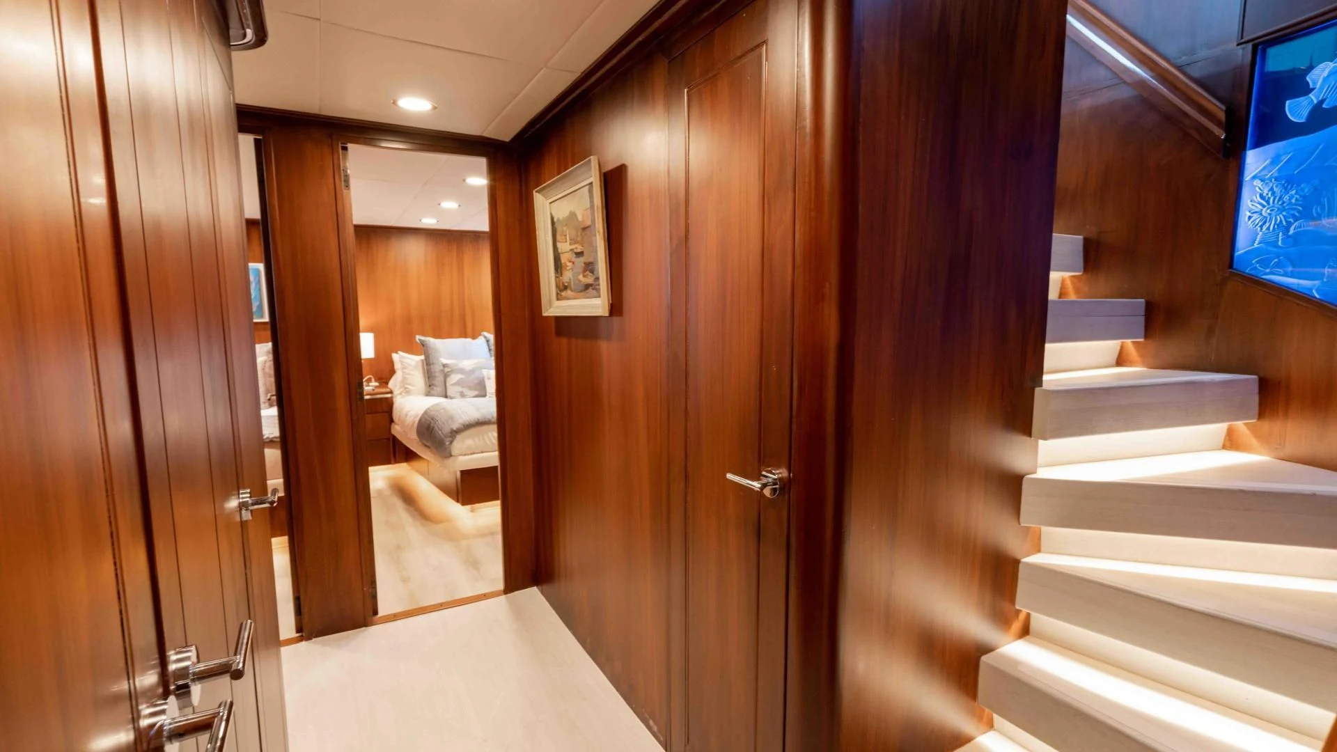 a room with wooden doors aboard ARIES Yacht for Sale