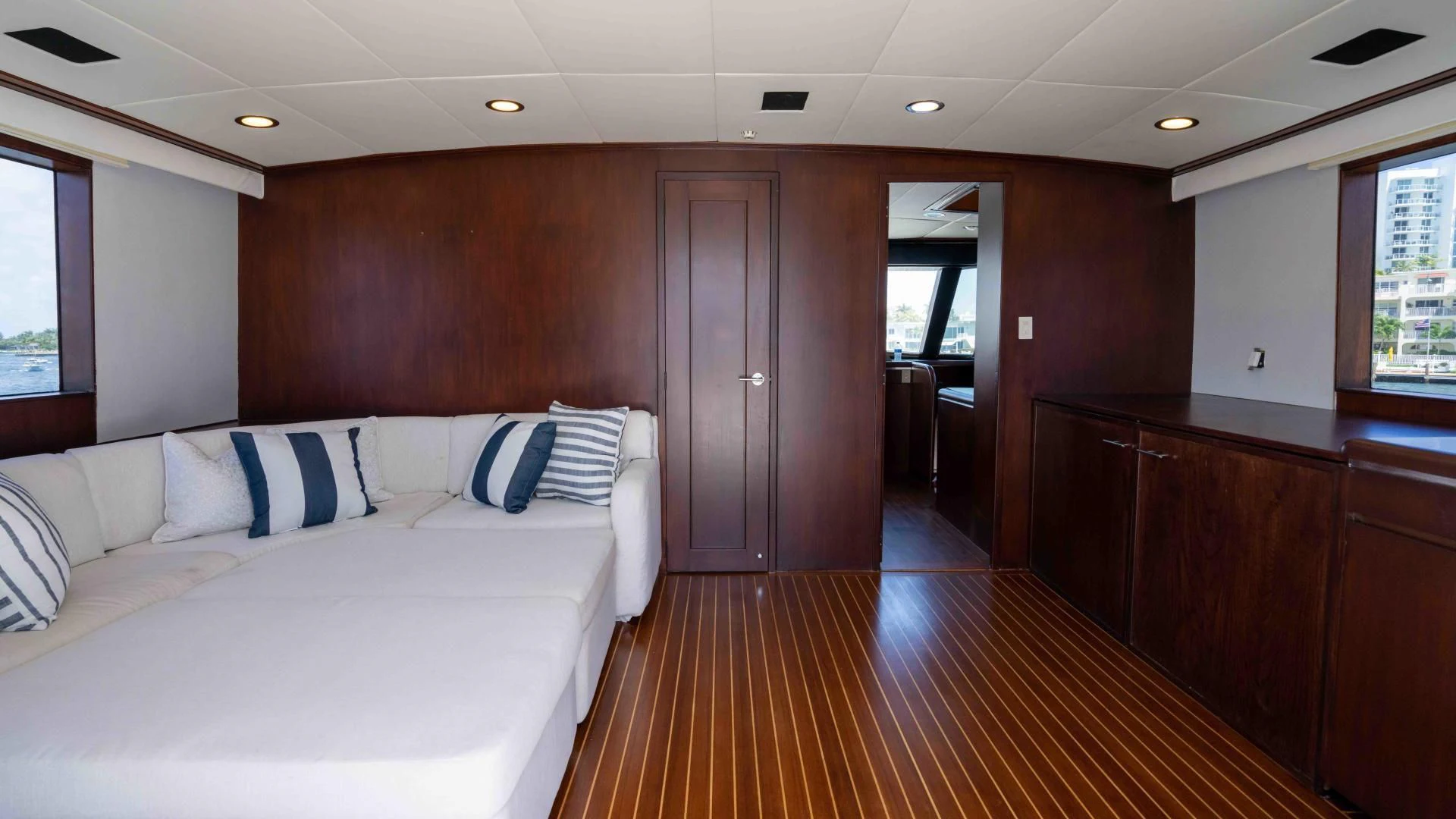 a large bedroom with a bed aboard ARIES Yacht for Sale