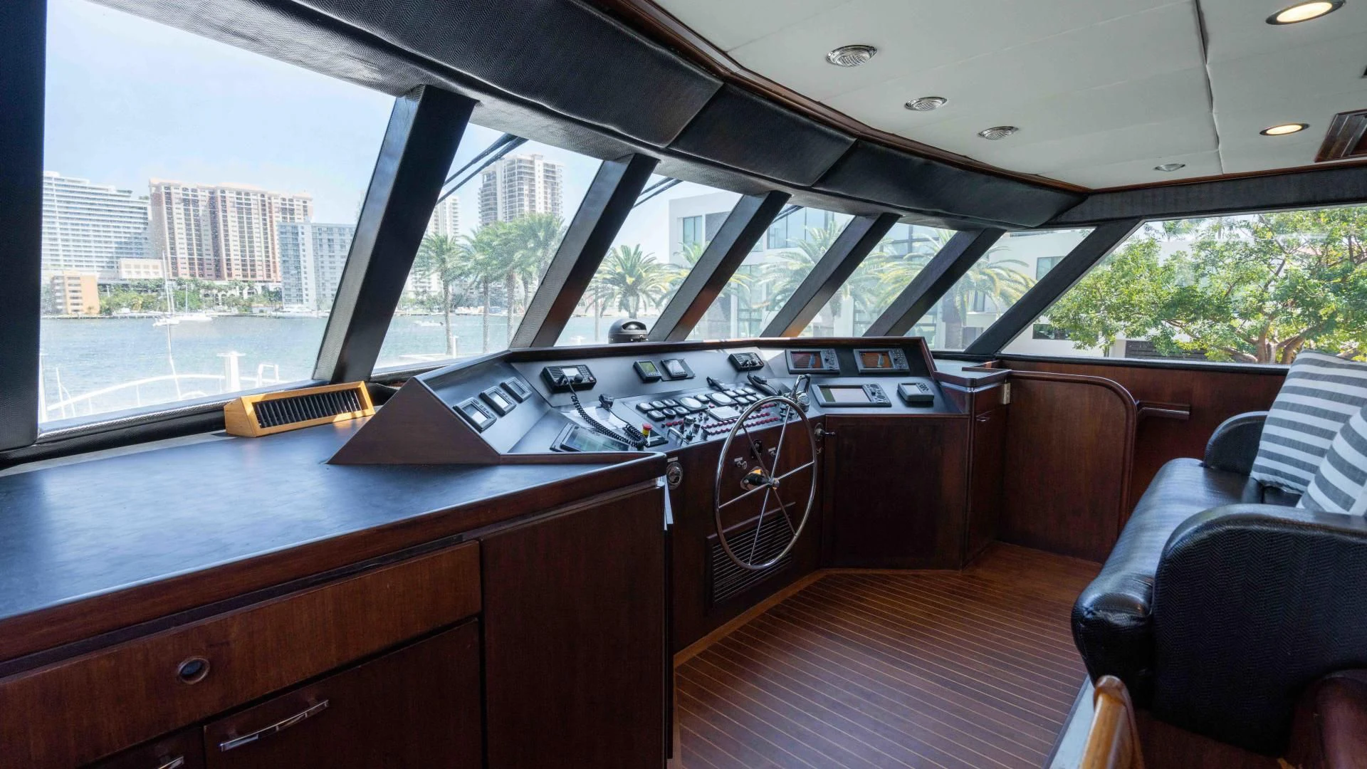 a room with a table and chairs aboard ARIES Yacht for Sale