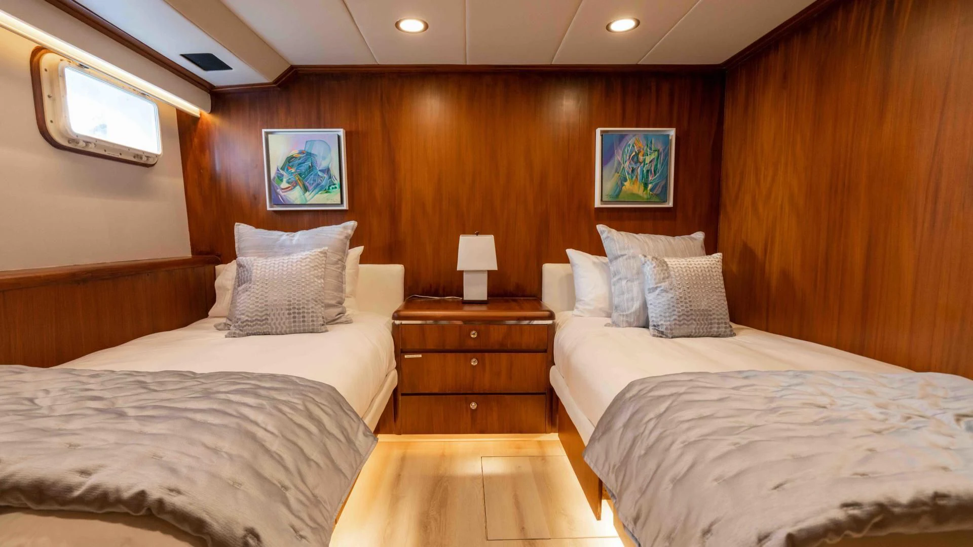 a room with two beds aboard ARIES Yacht for Sale