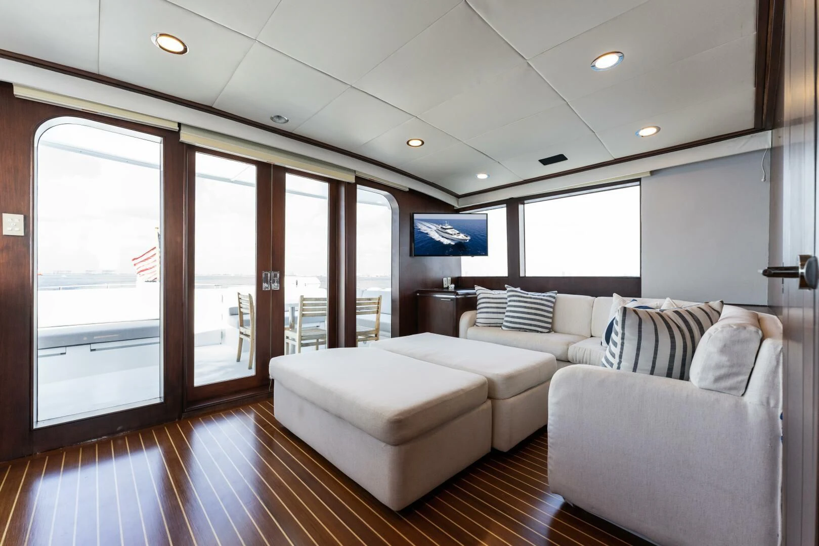 a living room with a large window aboard ARIES Yacht for Sale