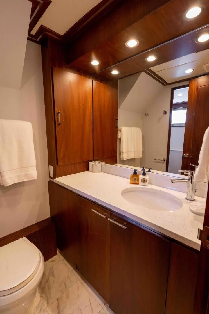 a bathroom with a sink and a toilet aboard ARIES Yacht for Sale