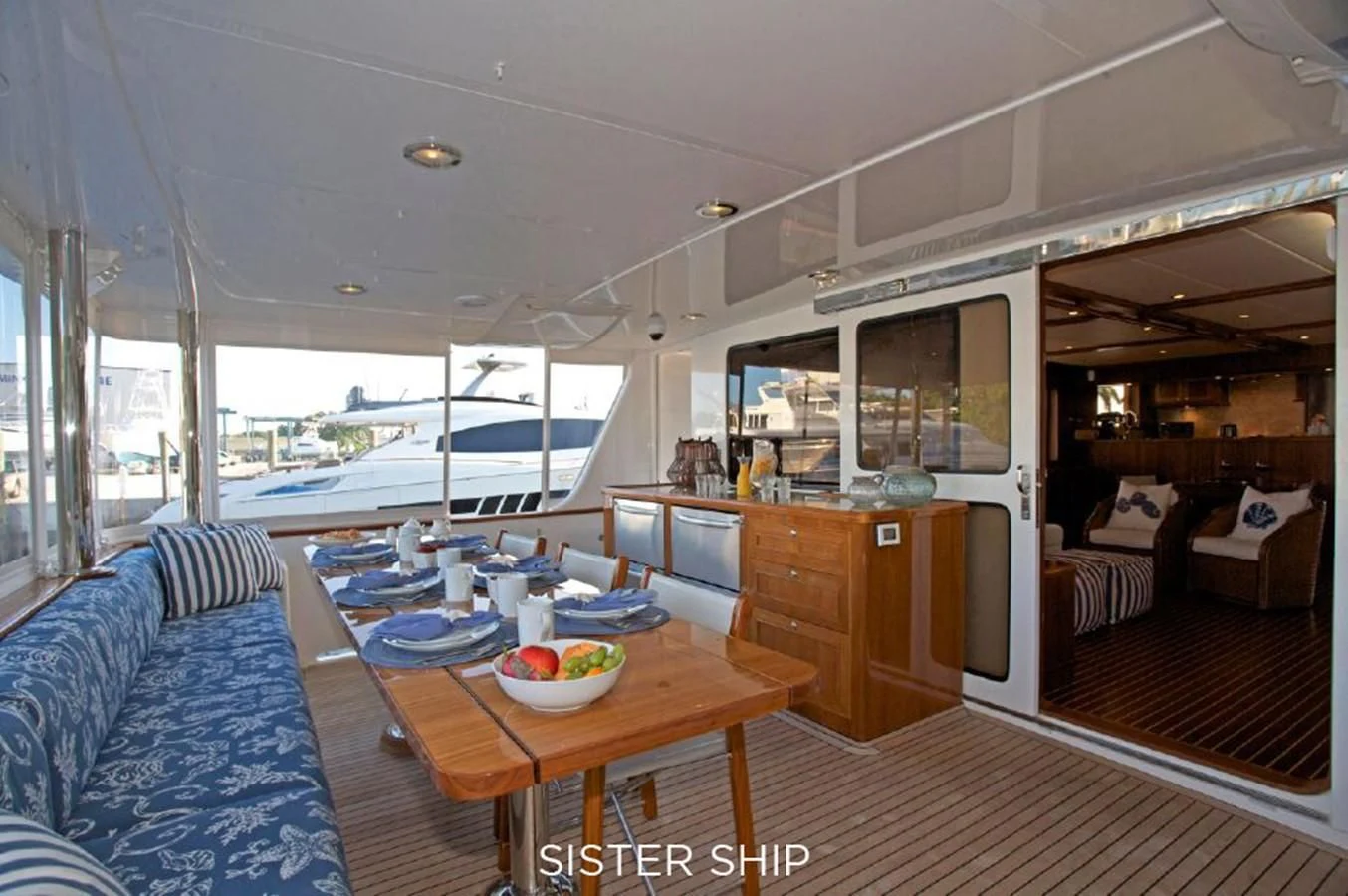 a large open kitchen and dining area aboard 860 MY Yacht for Sale