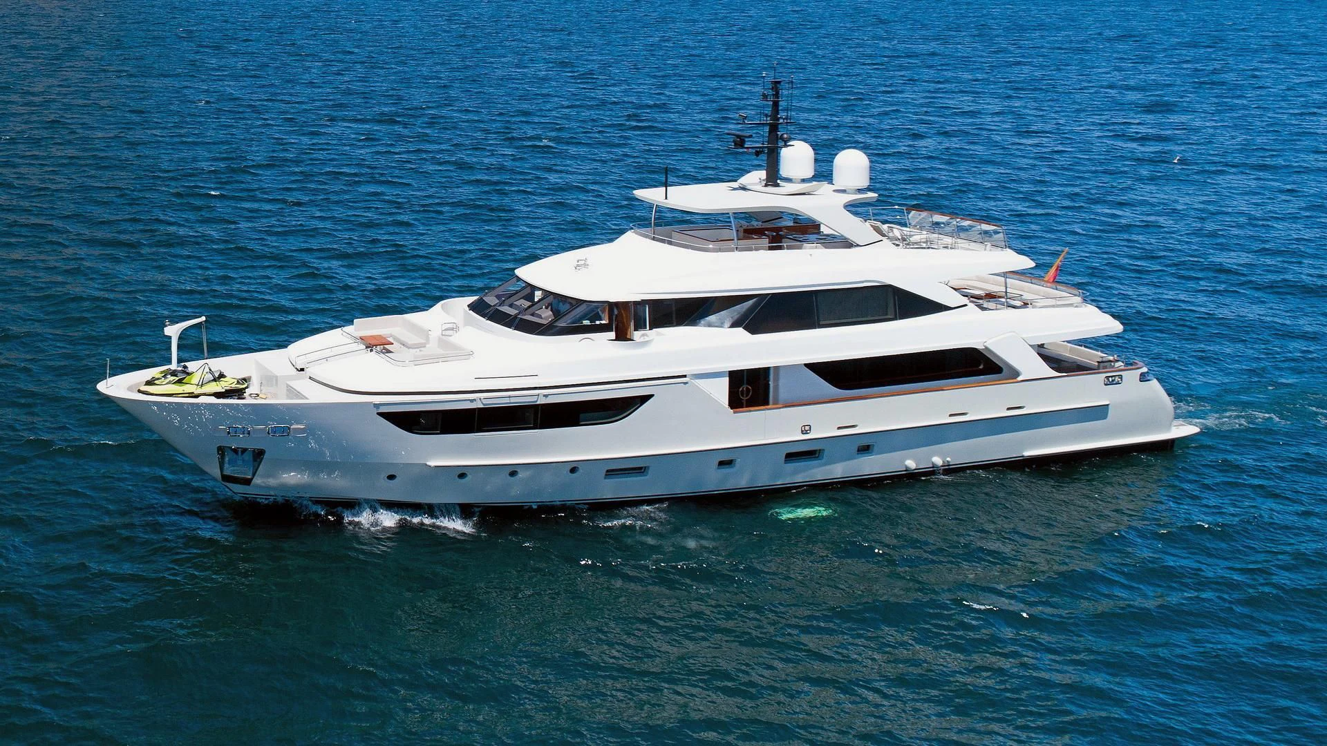 a white yacht in the water aboard SUPERNOVA Yacht for Sale