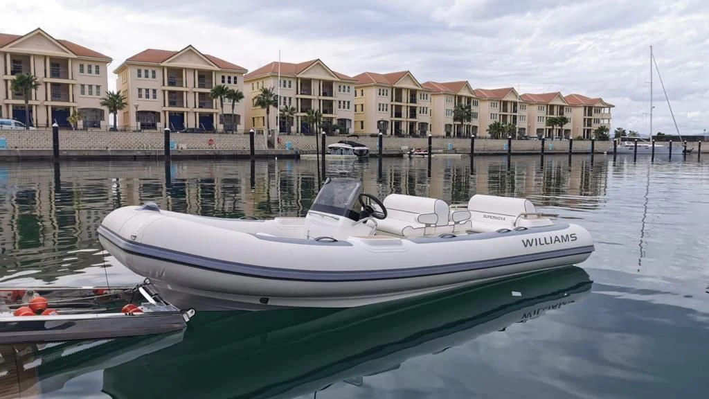 a boat in a harbor aboard SUPERNOVA Yacht for Sale