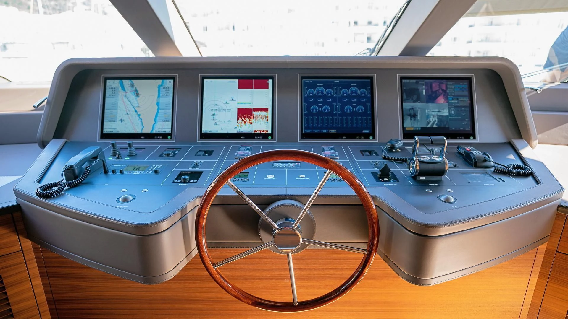 a control panel with a screen and several monitors aboard SUPERNOVA Yacht for Sale