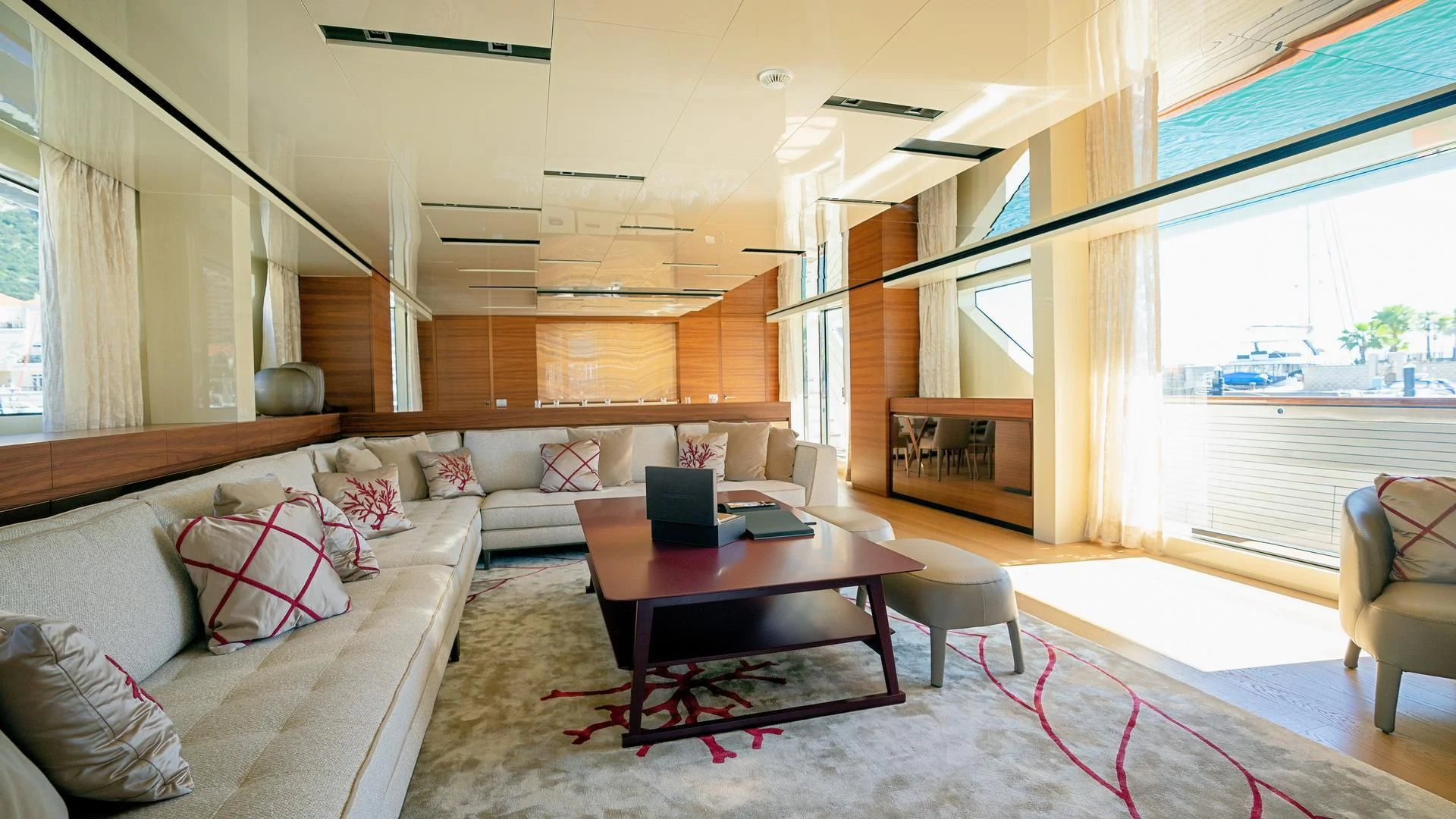a living room with a couch and a table aboard SUPERNOVA Yacht for Sale