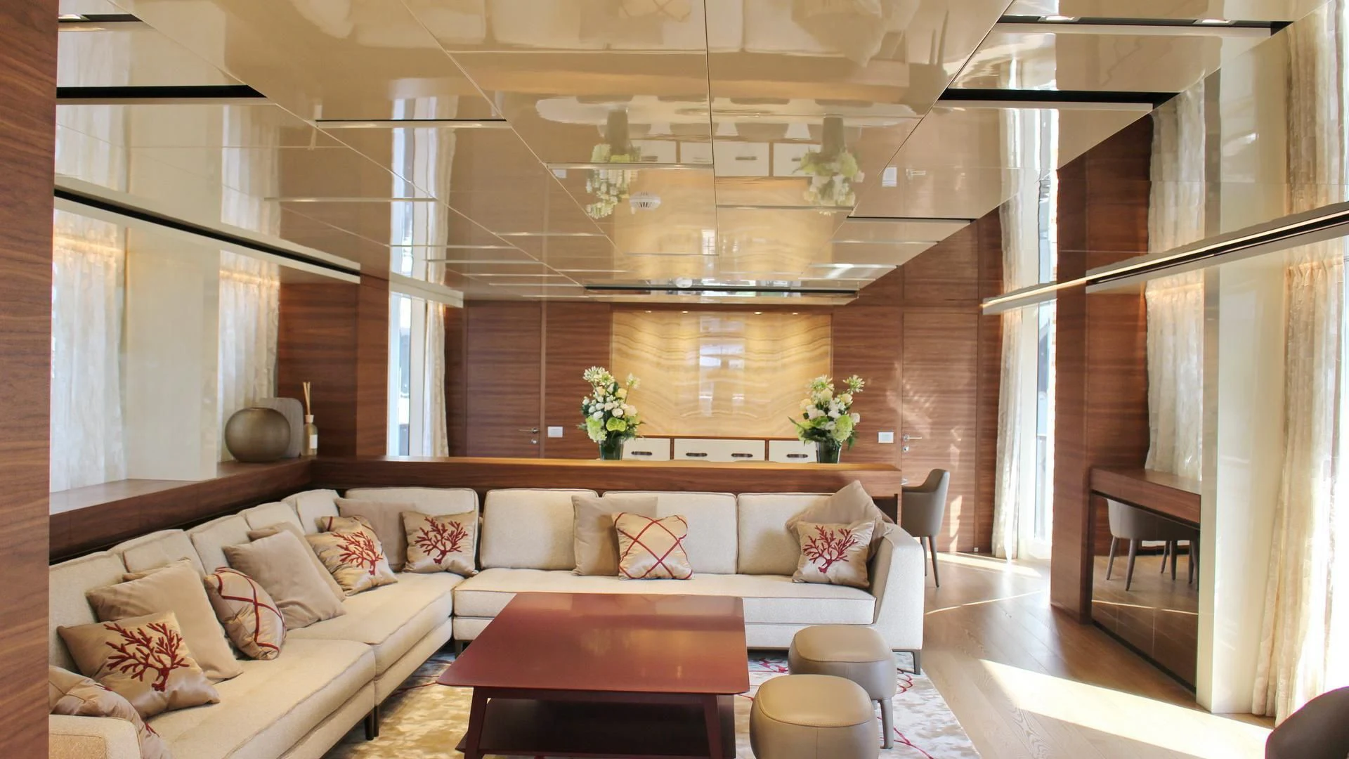 a living room with a couch and a table aboard SUPERNOVA Yacht for Sale