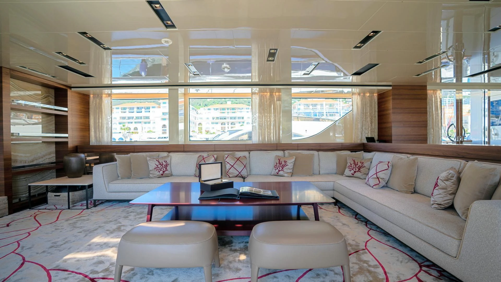 a living room with a large window aboard SUPERNOVA Yacht for Sale