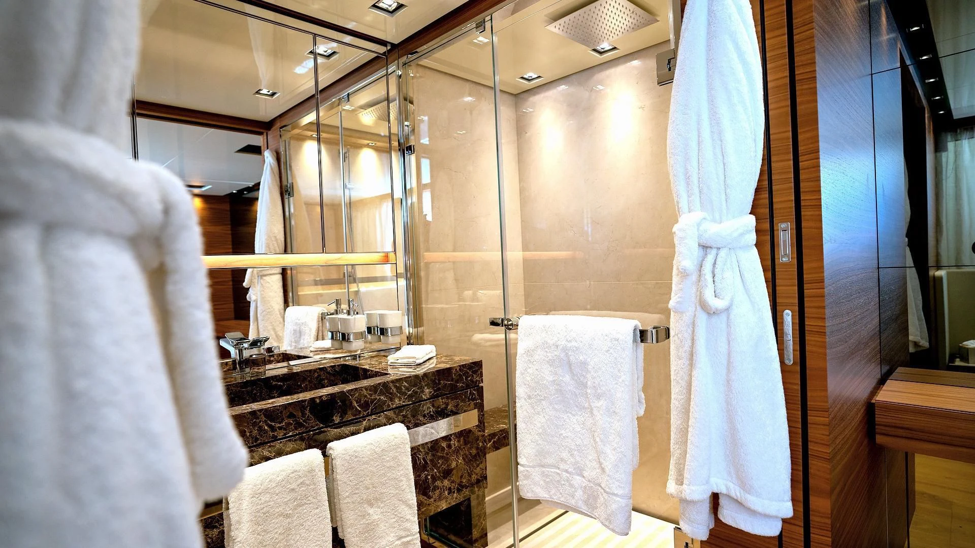a bathroom with a glass shower aboard SUPERNOVA Yacht for Sale
