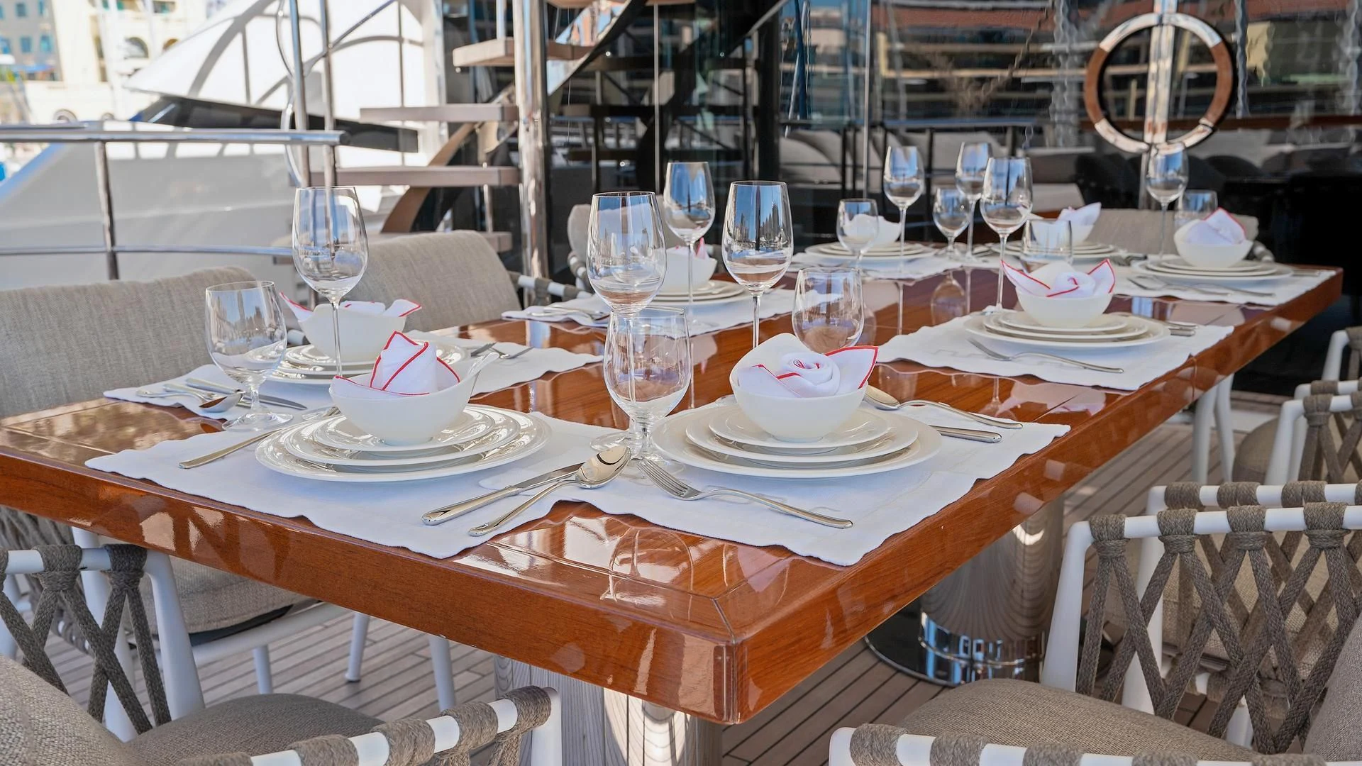a table set for a dinner aboard SUPERNOVA Yacht for Sale