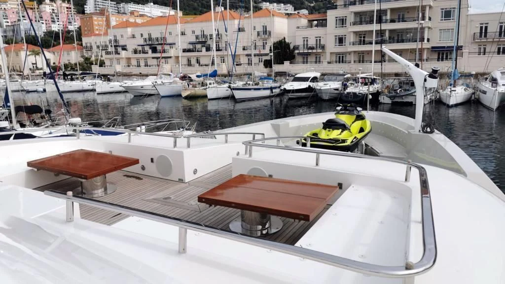 a boat in a harbor aboard SUPERNOVA Yacht for Sale