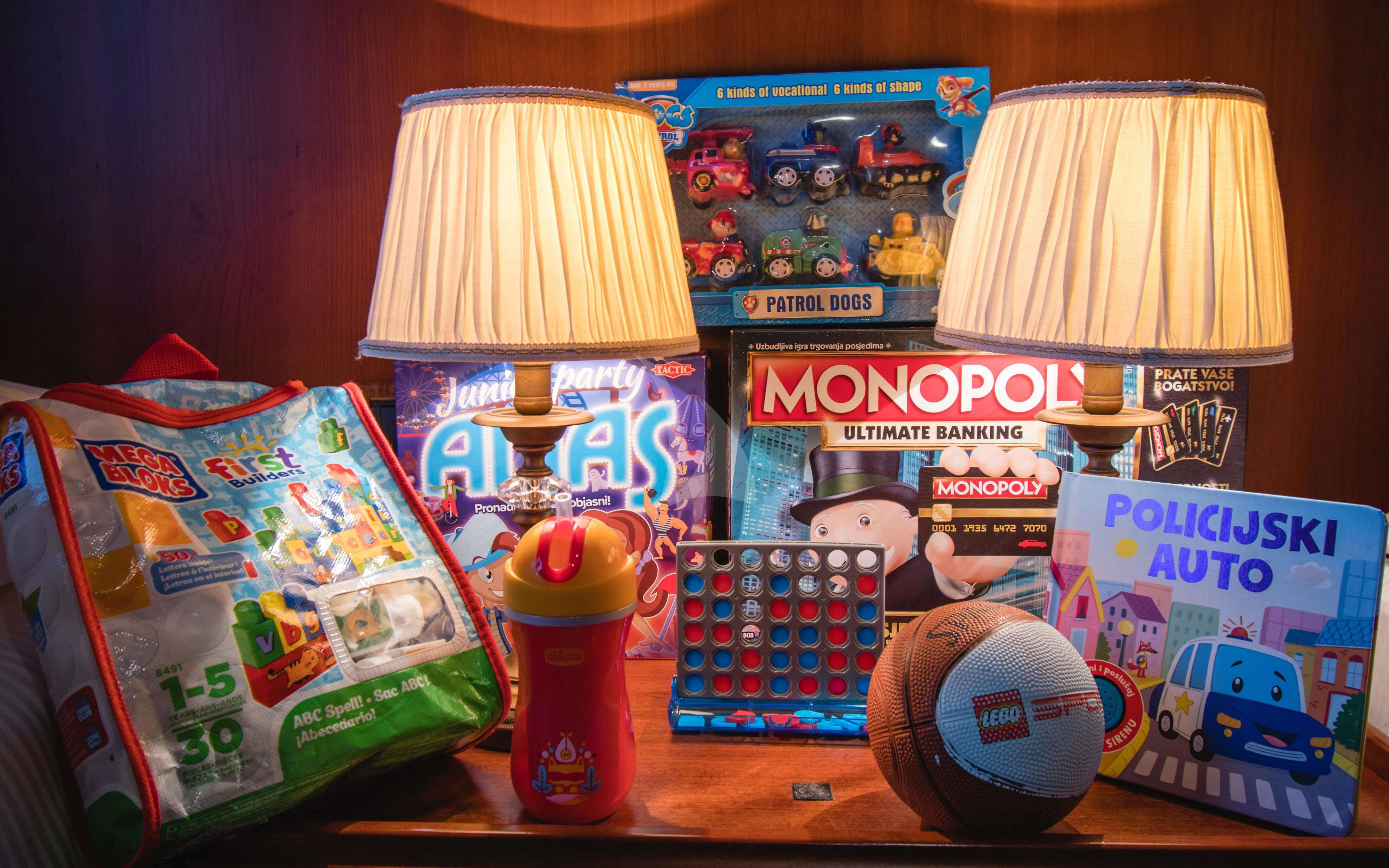 a table with a group of toys and a lamp on it aboard SEAGULL II Yacht for Sale