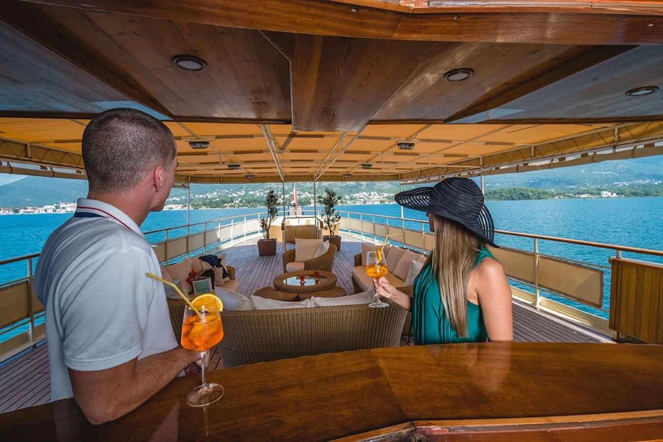 a man and a woman drinking wine aboard SEAGULL II Yacht for Sale