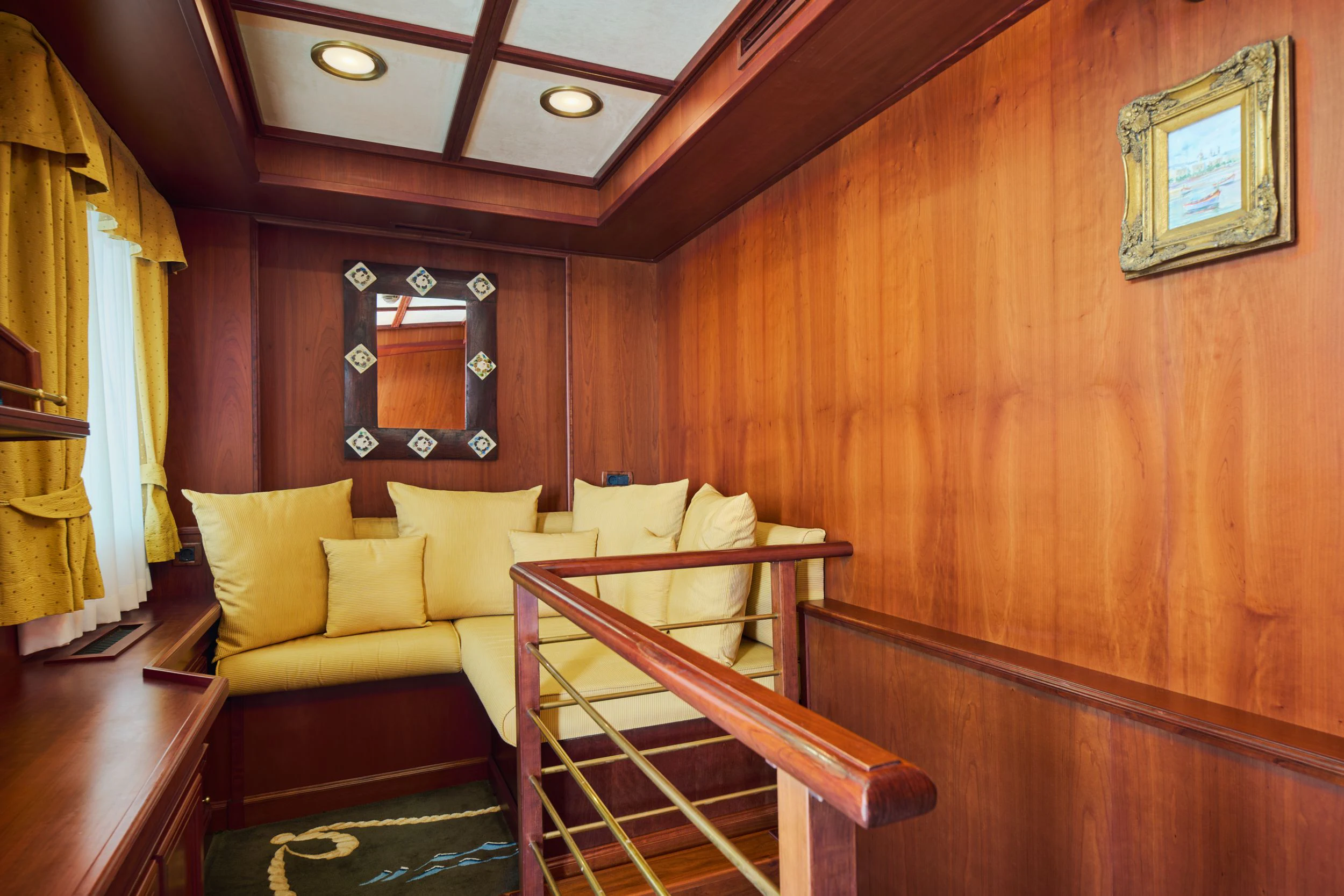 a room with a bed and a chair aboard SEAGULL II Yacht for Sale