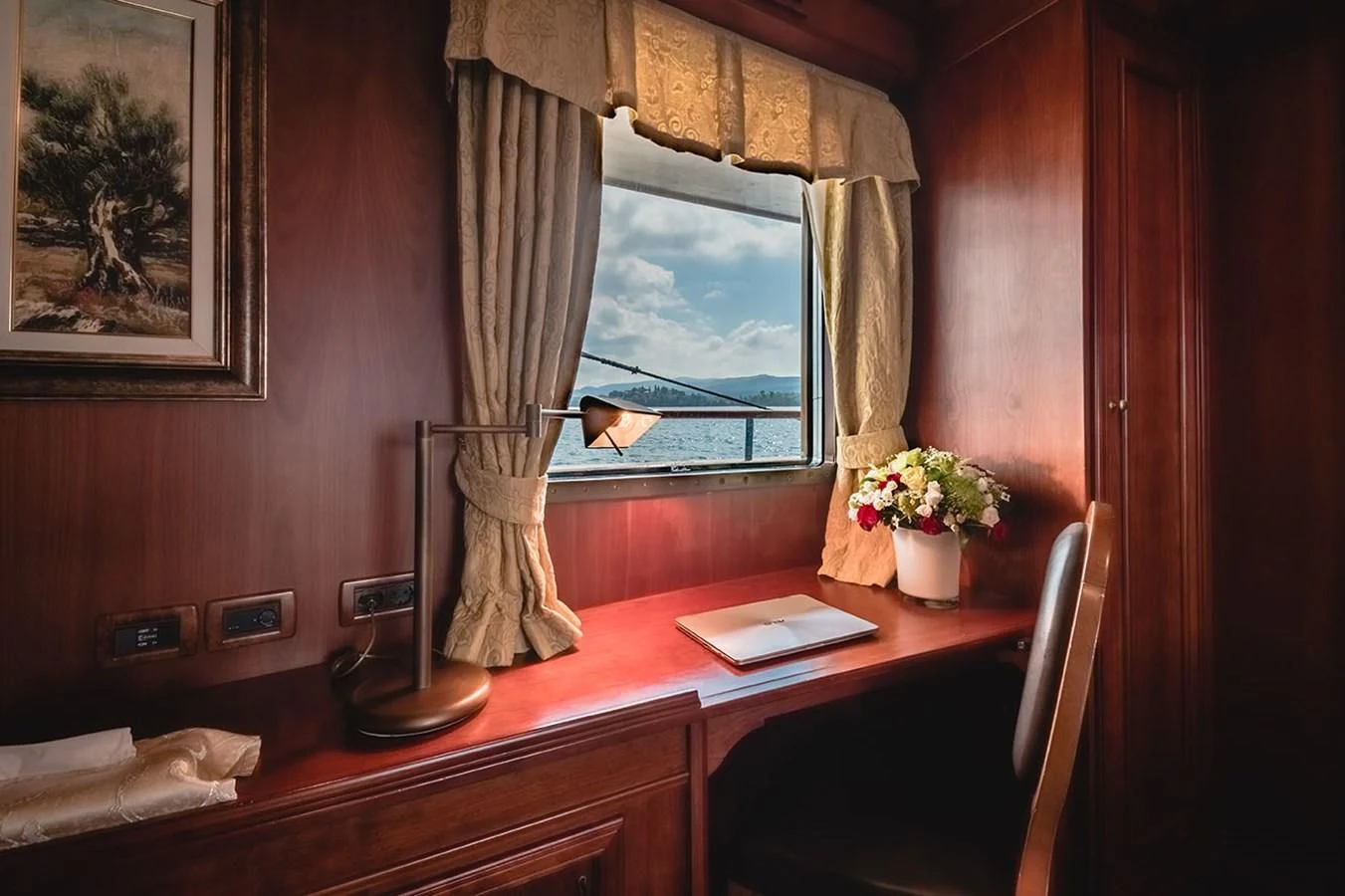 a bathroom with a mirror and a sink aboard SEAGULL II Yacht for Sale