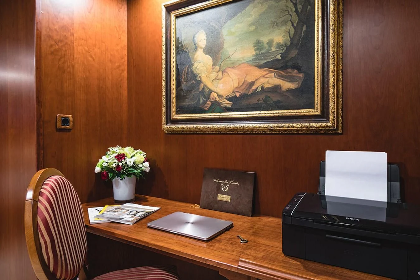 a desk with a laptop and a printer on it aboard SEAGULL II Yacht for Sale