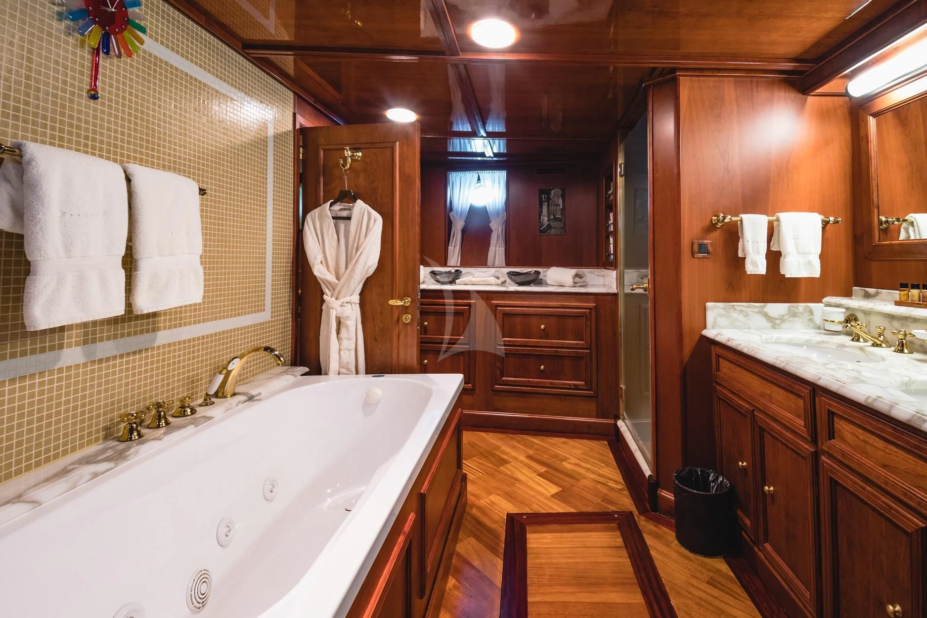 a bathroom with a bathtub and sink aboard SEAGULL II Yacht for Sale