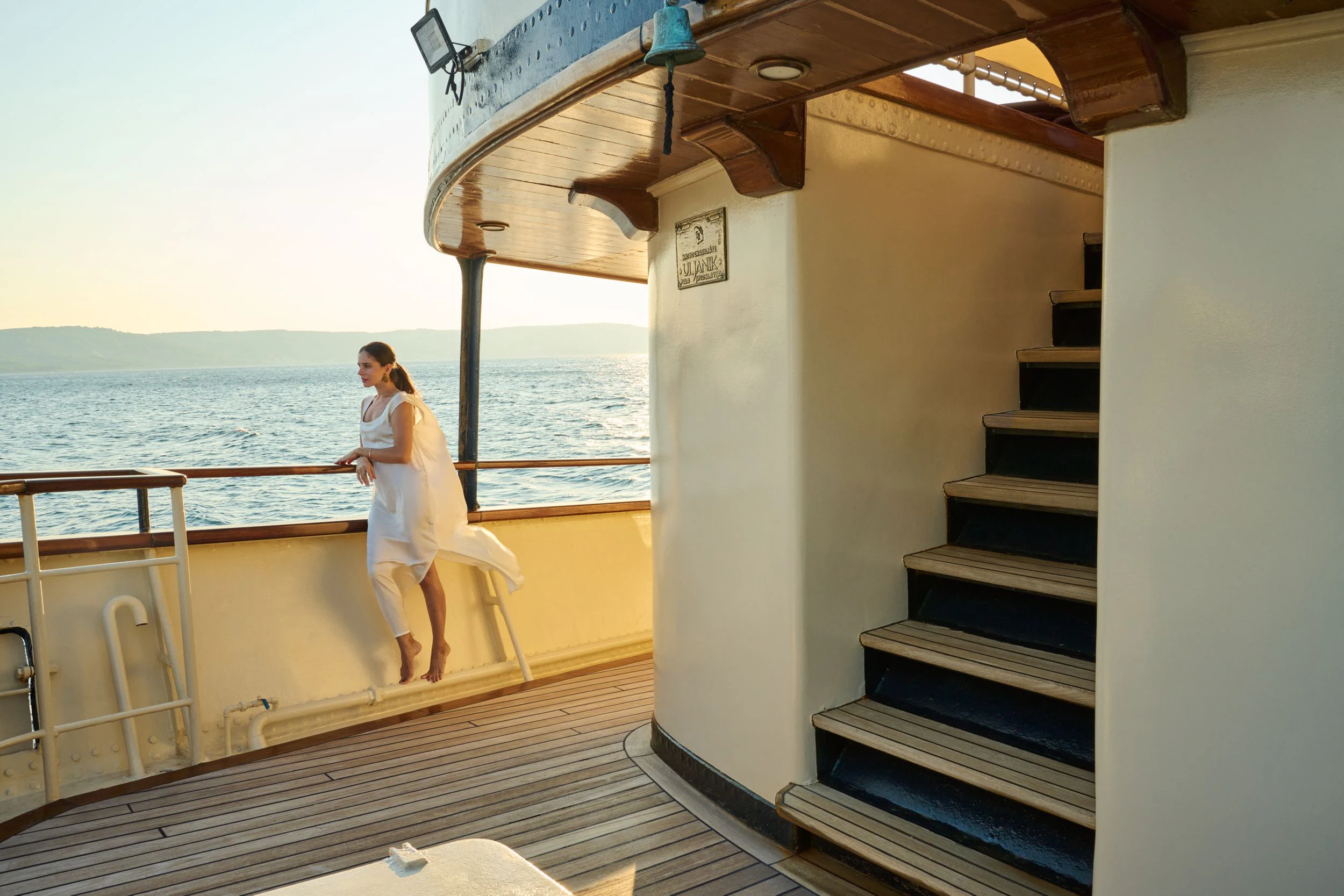 a man and woman posing on a boat aboard SEAGULL II Yacht for Sale