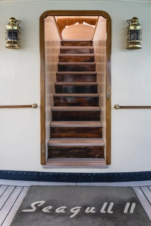 a wooden door with a wooden frame aboard SEAGULL II Yacht for Sale
