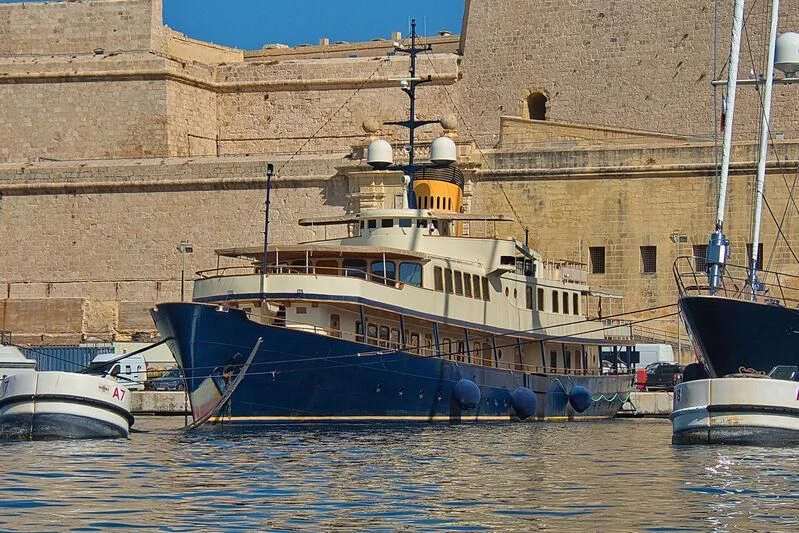a boat docked in a harbor aboard SEAGULL II Yacht for Sale