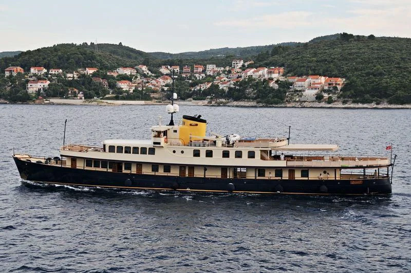 a large ship in the water aboard SEAGULL II Yacht for Sale