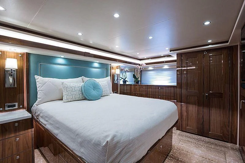 a bed in a room aboard PARTY OF FIVE Yacht for Sale