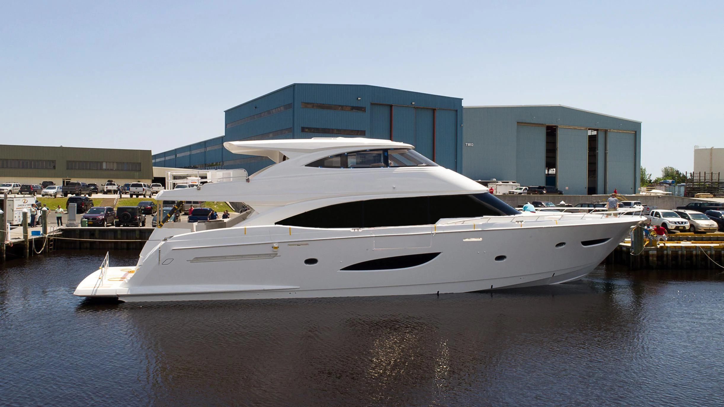 a yacht docked at a pier aboard OBSESSION Yacht for Sale