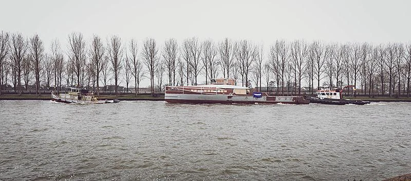 a body of water with boats on it and trees in the background aboard BAD COMPANY SUPPORT Yacht for Charter