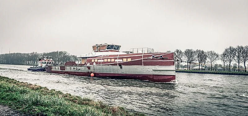 a large boat on the water aboard BAD COMPANY SUPPORT Yacht for Charter