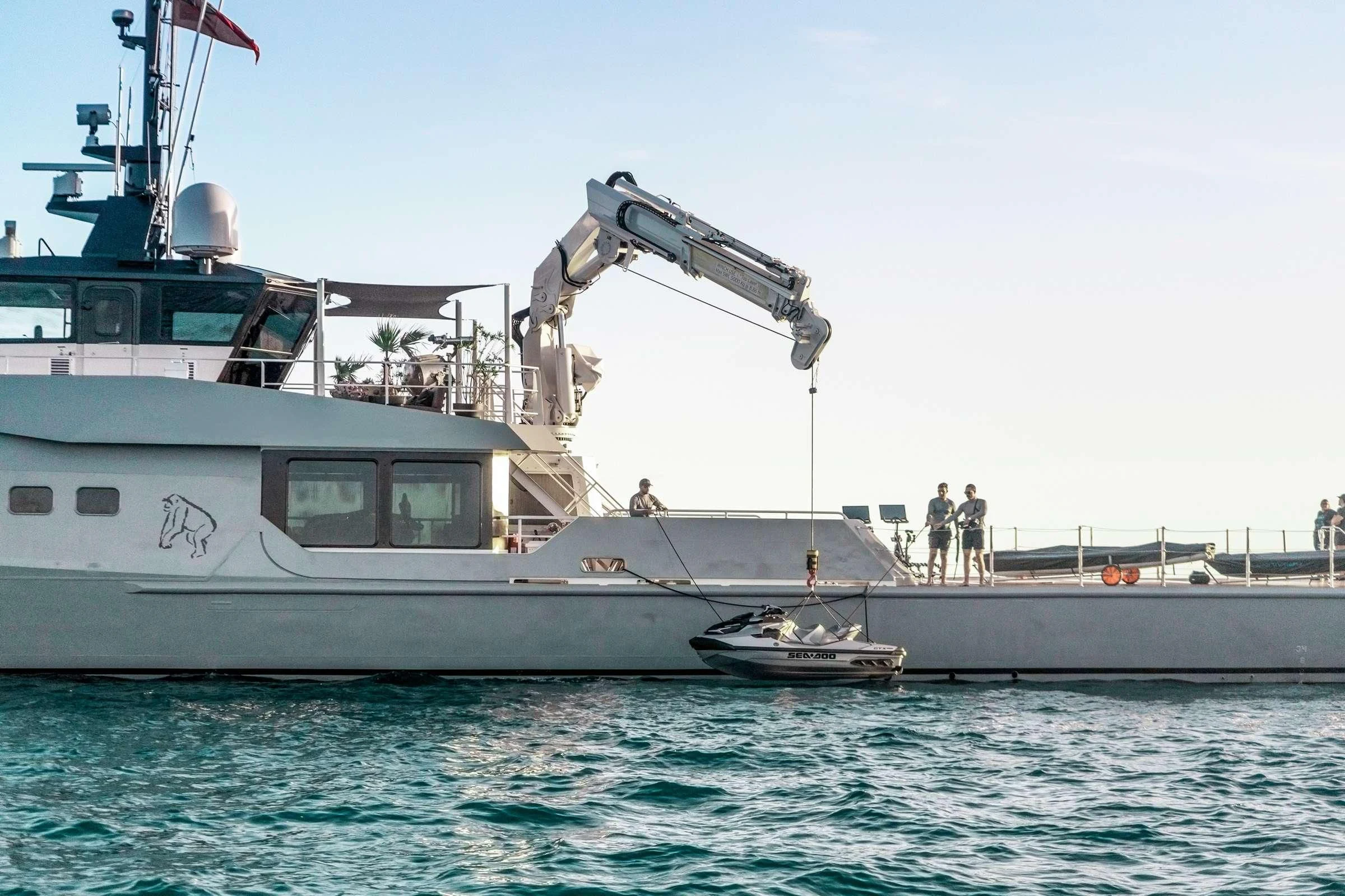 a boat with a satellite dish on the deck aboard BAD COMPANY SUPPORT Yacht for Charter