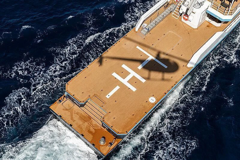 a large building with a sign on it aboard BAD COMPANY SUPPORT Yacht for Charter