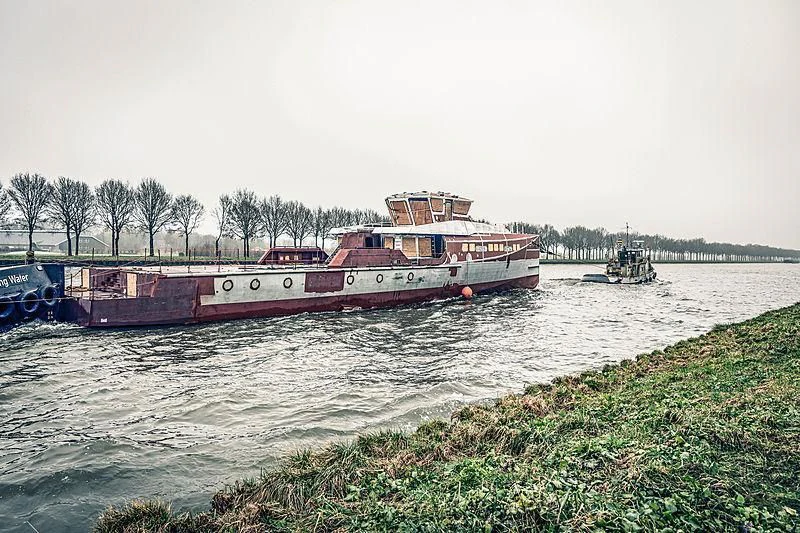 a couple of boats on a river aboard BAD COMPANY SUPPORT Yacht for Charter