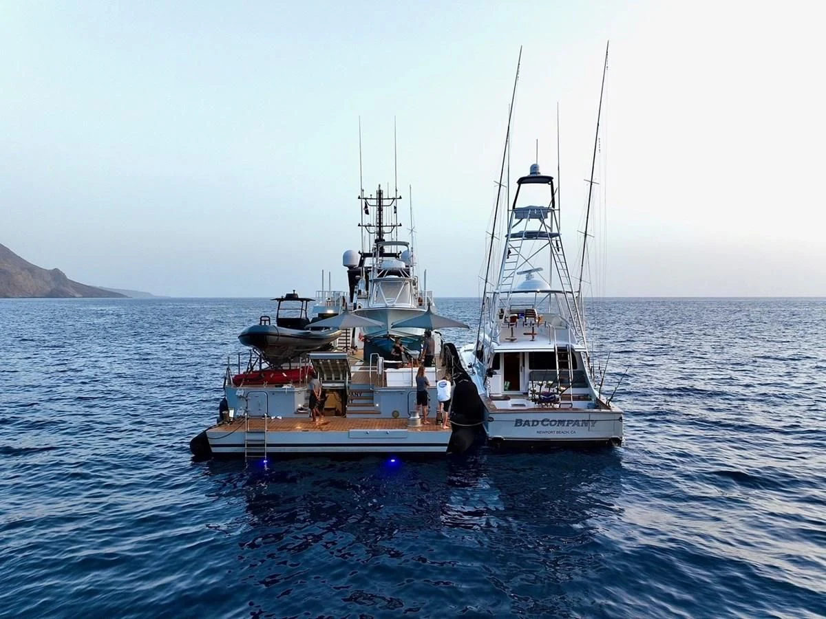a boat with people on it aboard BAD COMPANY SUPPORT Yacht for Charter