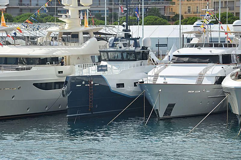 several boats docked in a harbor aboard BAD COMPANY SUPPORT Yacht for Charter