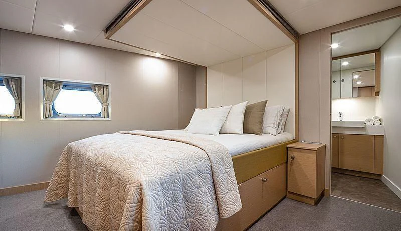 a bed in a room aboard BAD COMPANY SUPPORT Yacht for Charter
