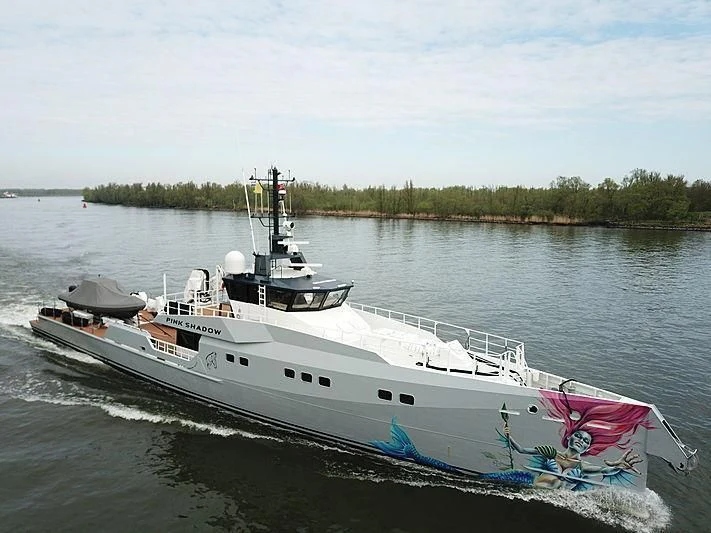 a large ship sailing on water aboard BAD COMPANY SUPPORT Yacht for Charter