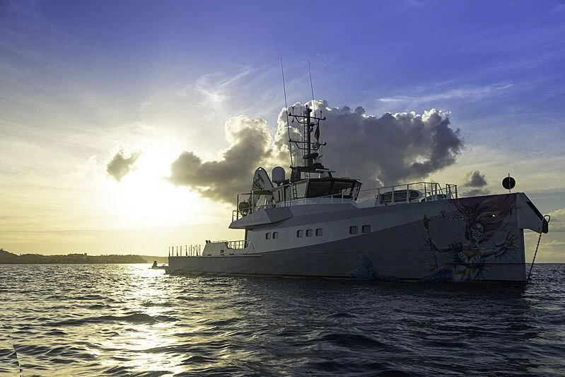 a large ship in the water aboard BAD COMPANY SUPPORT Yacht for Charter