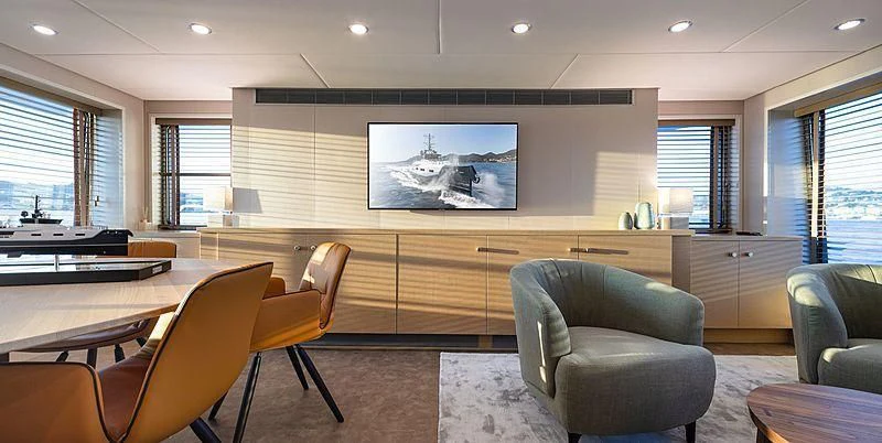 a room with chairs and a table aboard BAD COMPANY SUPPORT Yacht for Charter