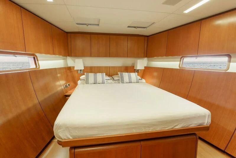 a bed in a room aboard BOMBARDA Yacht for Sale