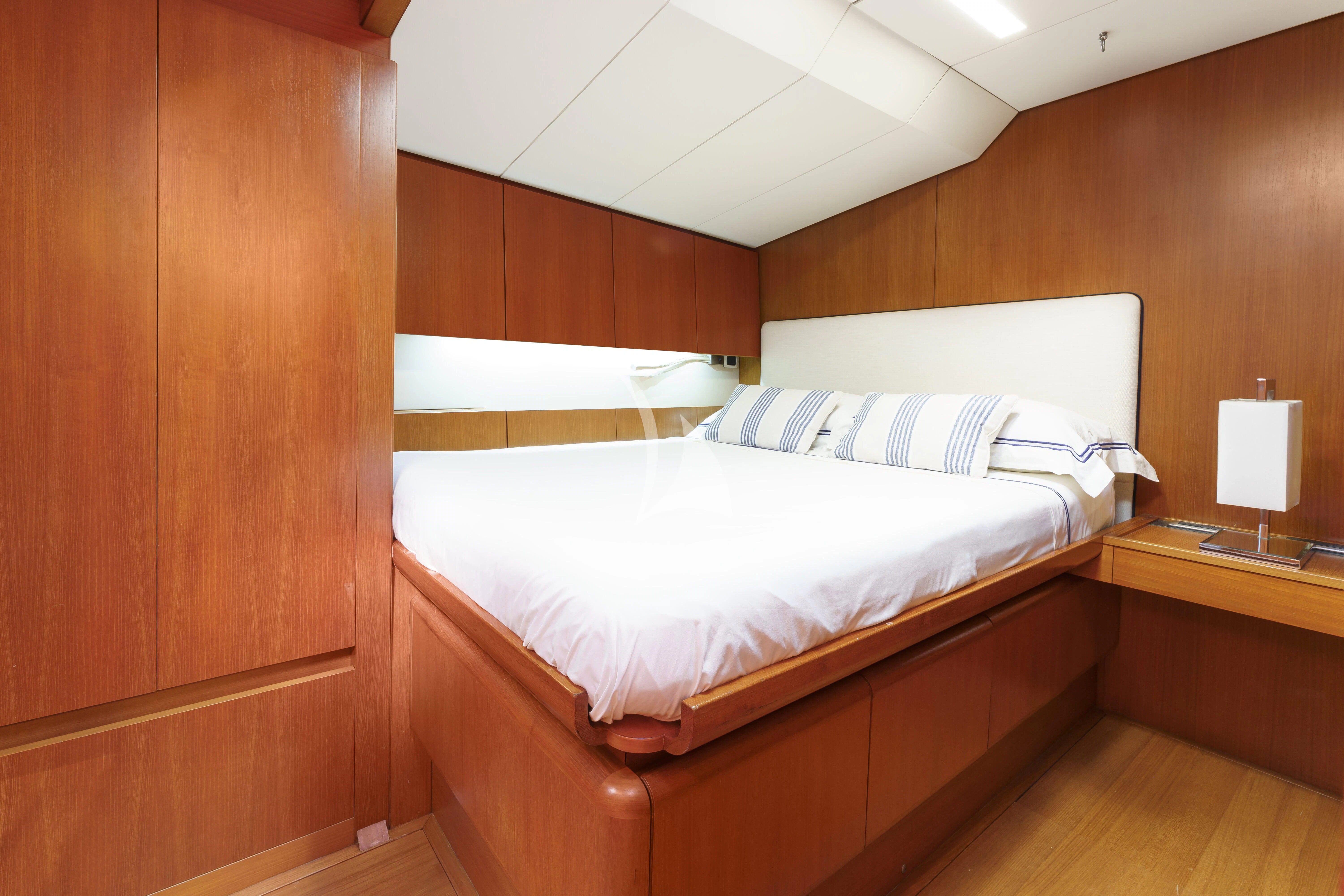 a bed in a room aboard BOMBARDA Yacht for Sale