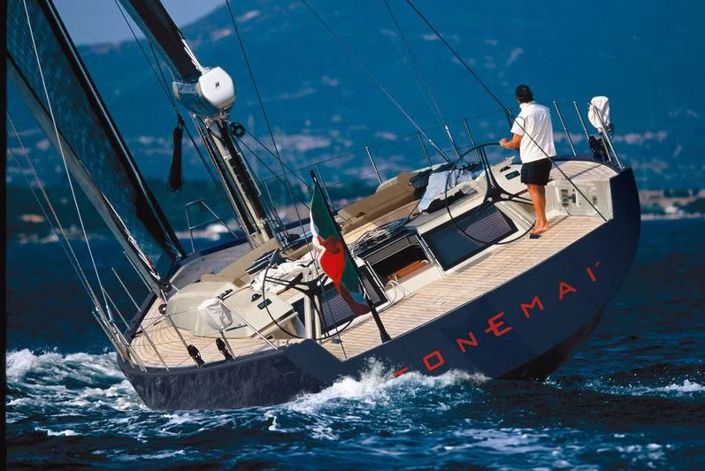 a man standing on a boat aboard BOMBARDA Yacht for Sale