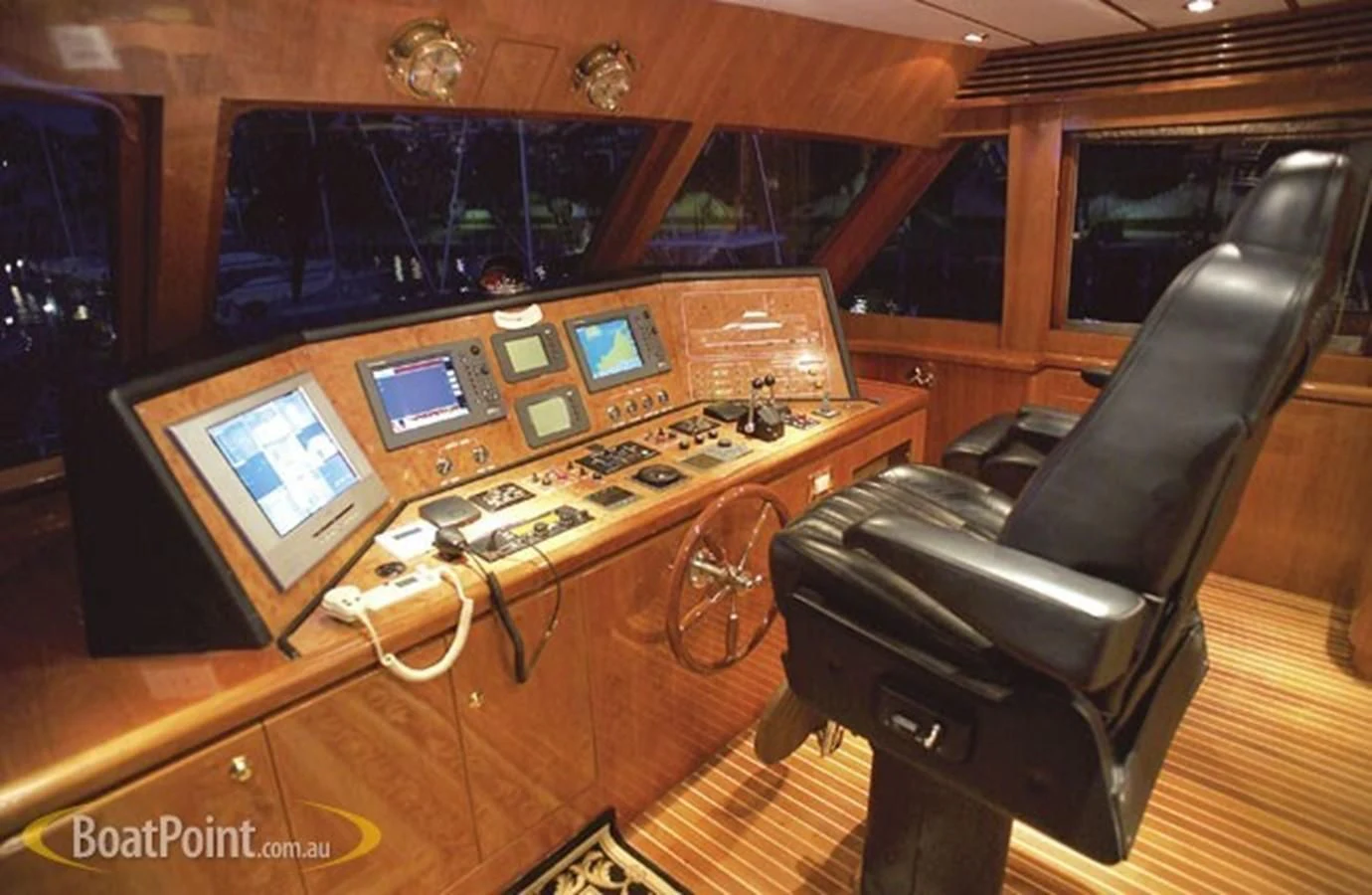 a room with a desk and computer aboard SALT II Yacht for Sale