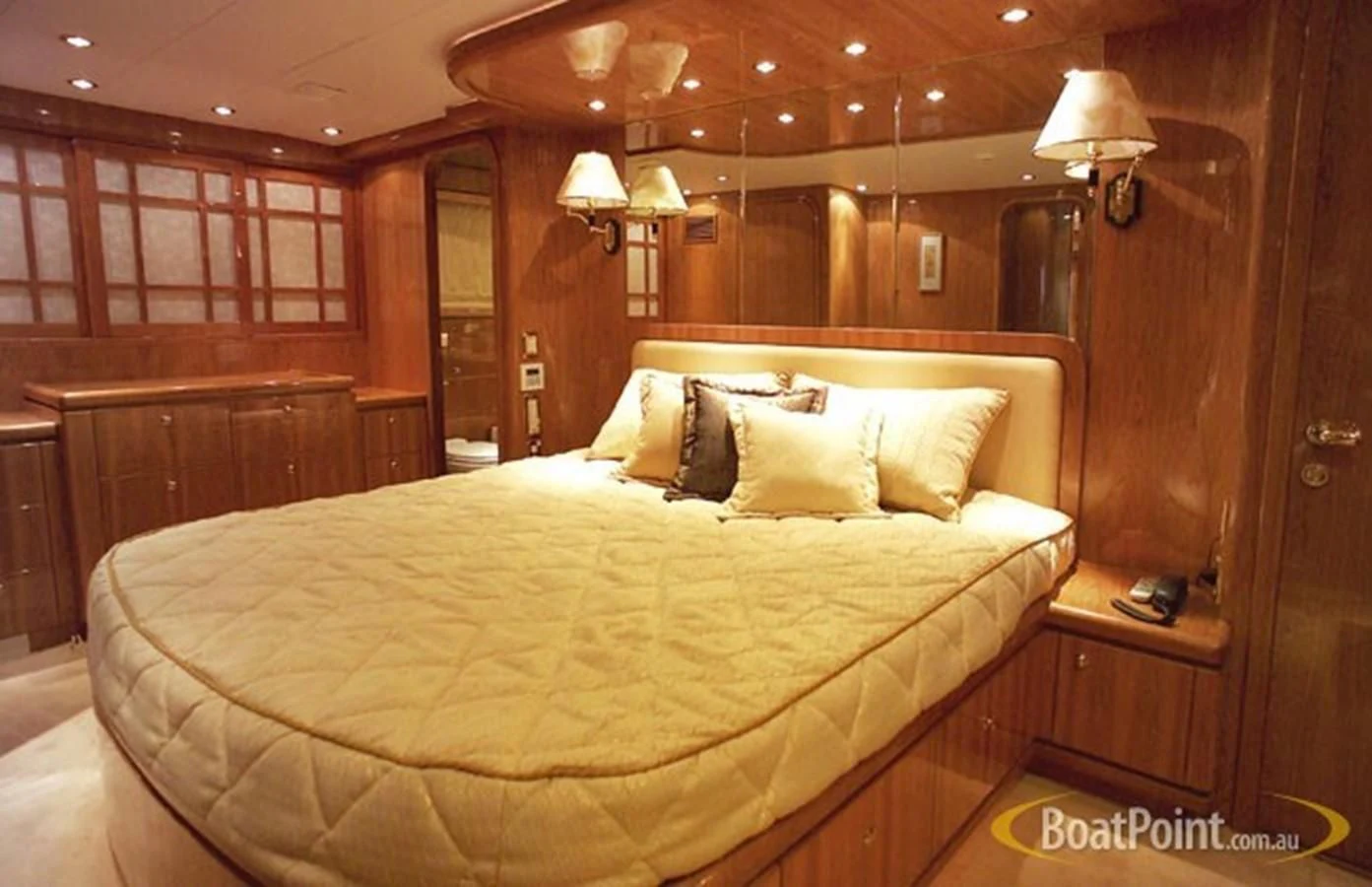 a bed in a room aboard SALT II Yacht for Sale