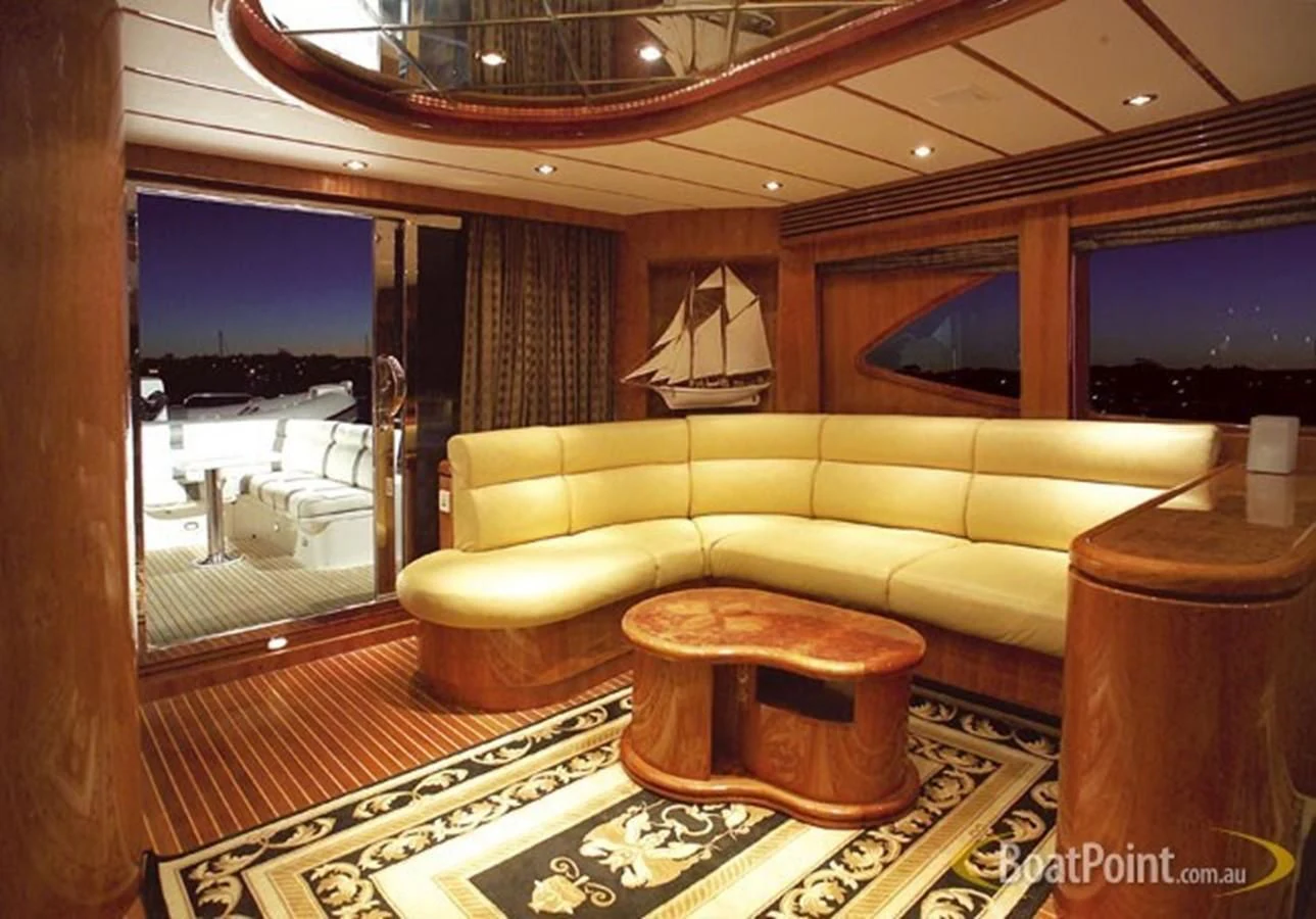 a living room with a large window aboard SALT II Yacht for Sale