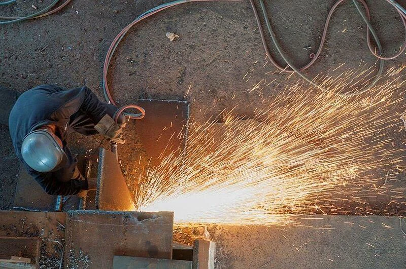 a person working on a wall aboard ANTONINI NAVI SUY 135 Yacht for Sale