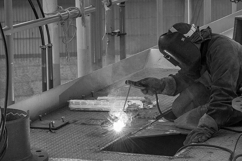 a man working on a machine aboard ANTONINI NAVI SUY 135 Yacht for Sale
