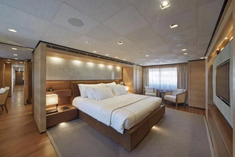 a large bedroom with a large bed aboard APRIES W Yacht for Sale